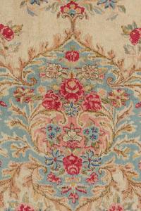 A Kirman Wool Rug