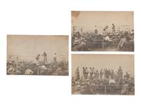 [BOXING] -- [JOHNSON, Jack (1878-1946)]. A group of 3 images of Johnson's bout with "Fireman" Jim Flynn. [Las Vegas, NM], [4 July 1912].