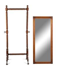 A Louis Philippe Carved Mahogany Cheval Mirror