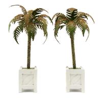 A Pair of Tole Models of Palm Trees, Height 18 inches.