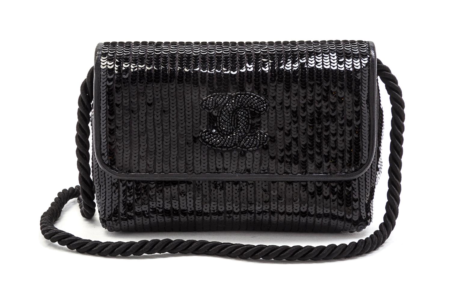 A Chanel Black Leather and Sequin Flap Bag, 6 1/2 x 4 1/2 x 3 inches.