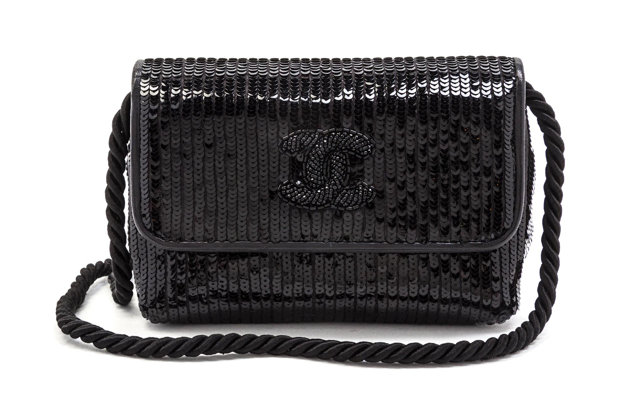 A Chanel Black Leather and Sequin Flap Bag, 6 1/2 x 4 1/2 x 3 inches.