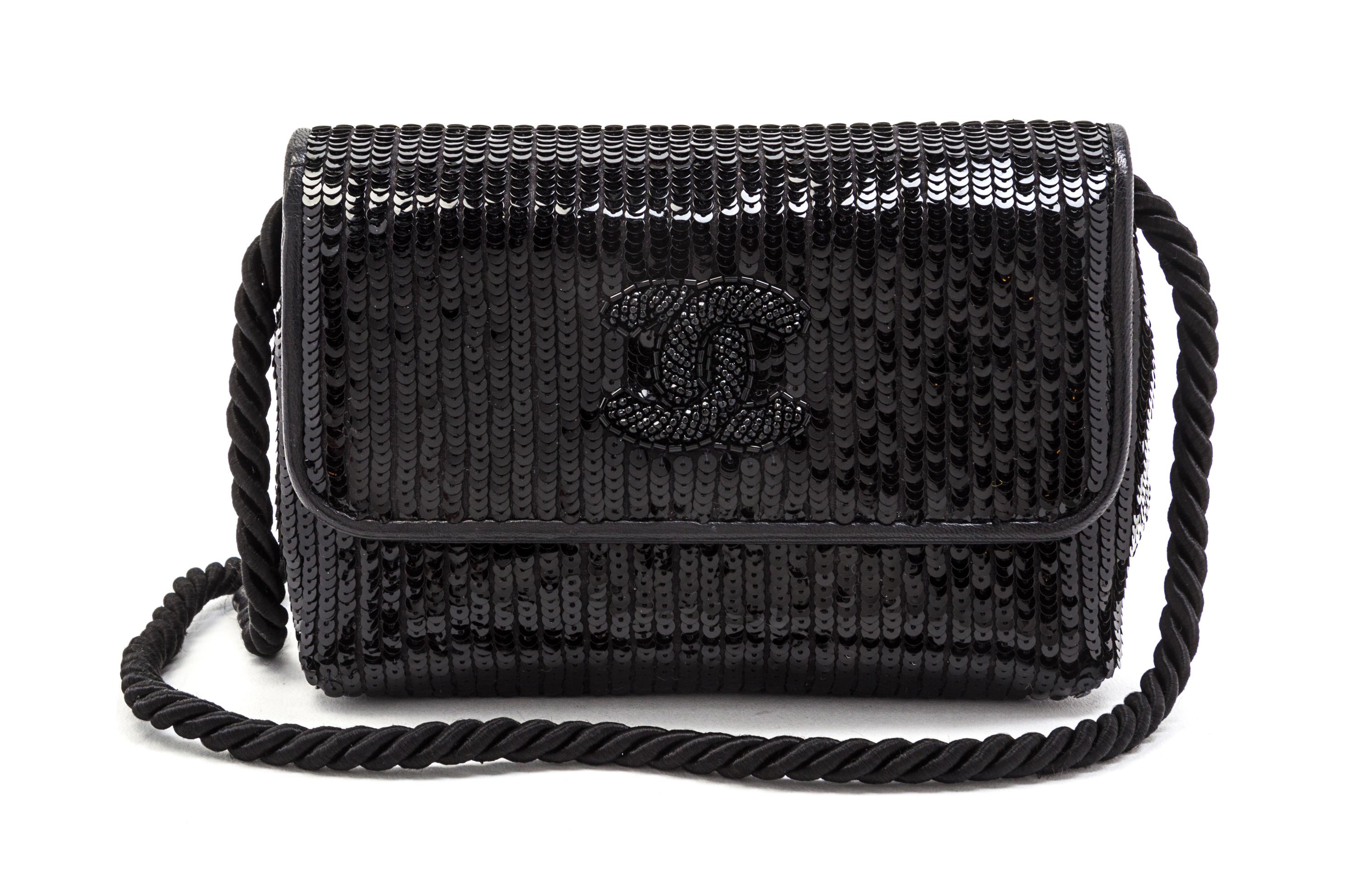 A Chanel Black Leather and Sequin Flap Bag, 6 1/2 x 4 1/2 x 3 inches.