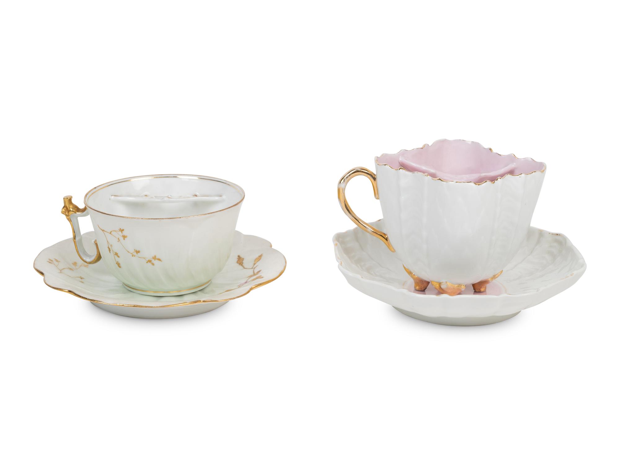Two Continental Porcelain Moustache Cups and Saucers