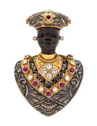 An 18 Karat Yellow Gold, Silver, Diamond and Ruby Blackamoor Brooch, Missiaglia, 15.35 dwts.