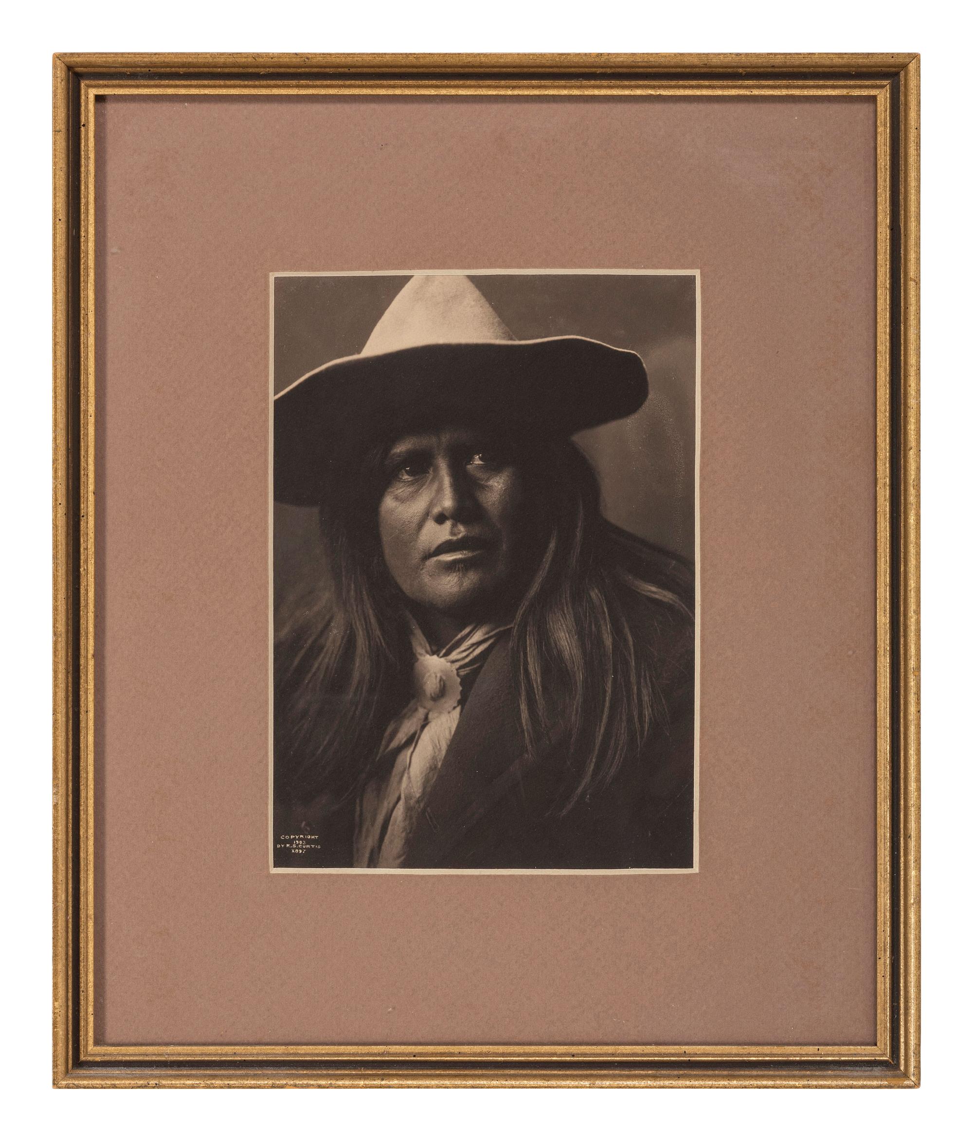 CURTIS, Edward S (1868-1952), photographer. 3 works, including two platinum photographs of a Native American subjects.