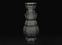 A Chinese patinated bronze hexagonal vase, Yuan to Ming Dynasty 加漆六方銅瓶 元或明