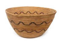 A Mission Indian Basket Bowl Height 10 1/2 x diameter 20 inches.