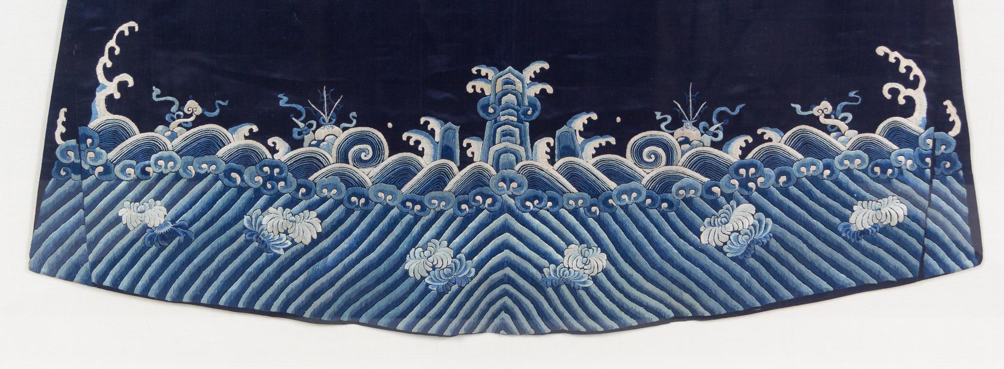 A Chinese Dark Blue Ground Embroidered Silk Lady's Robe