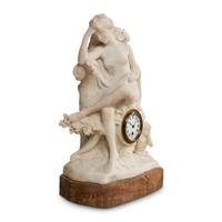 A Carved Marble Figural Mantel Clock