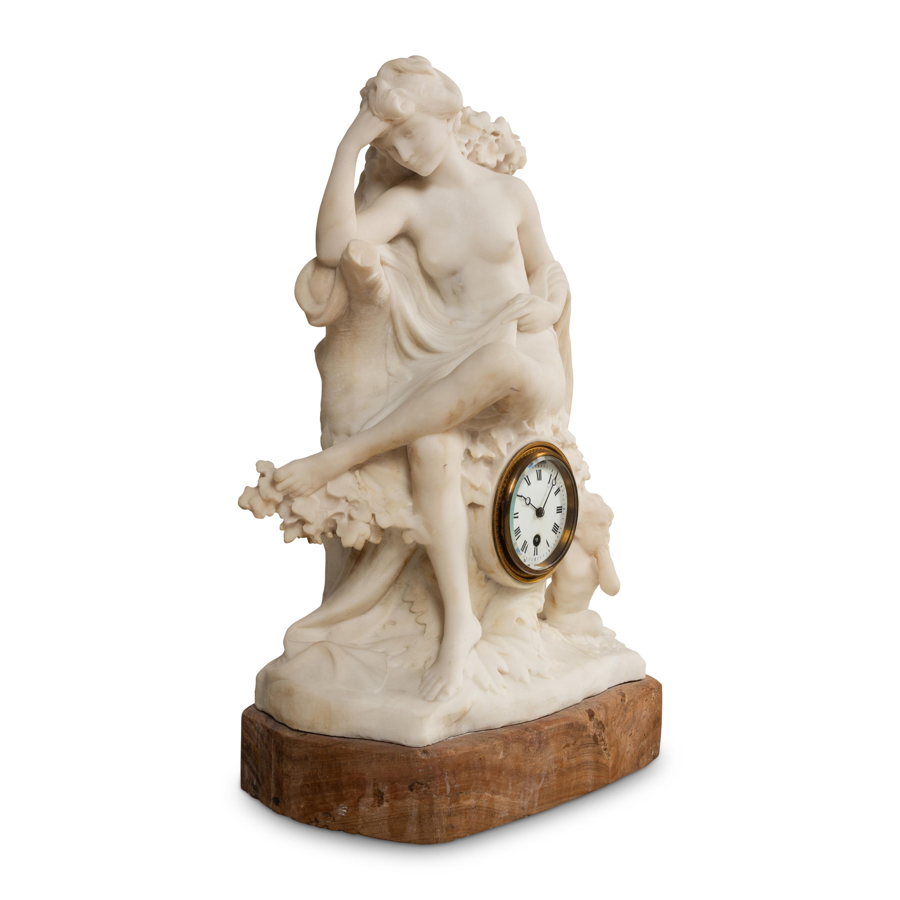 A Carved Marble Figural Mantel Clock