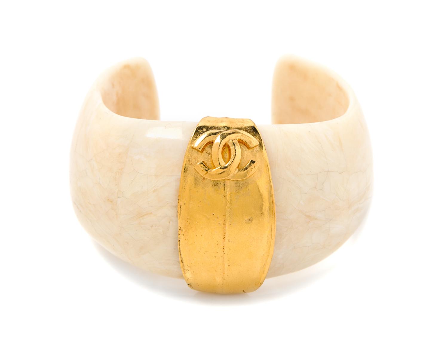 A Chanel Goldtone and Cream Cuff, 7" circumference.