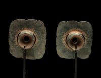 A Pair of Maya Jade Earspools in the Form of a Quetzal Bird