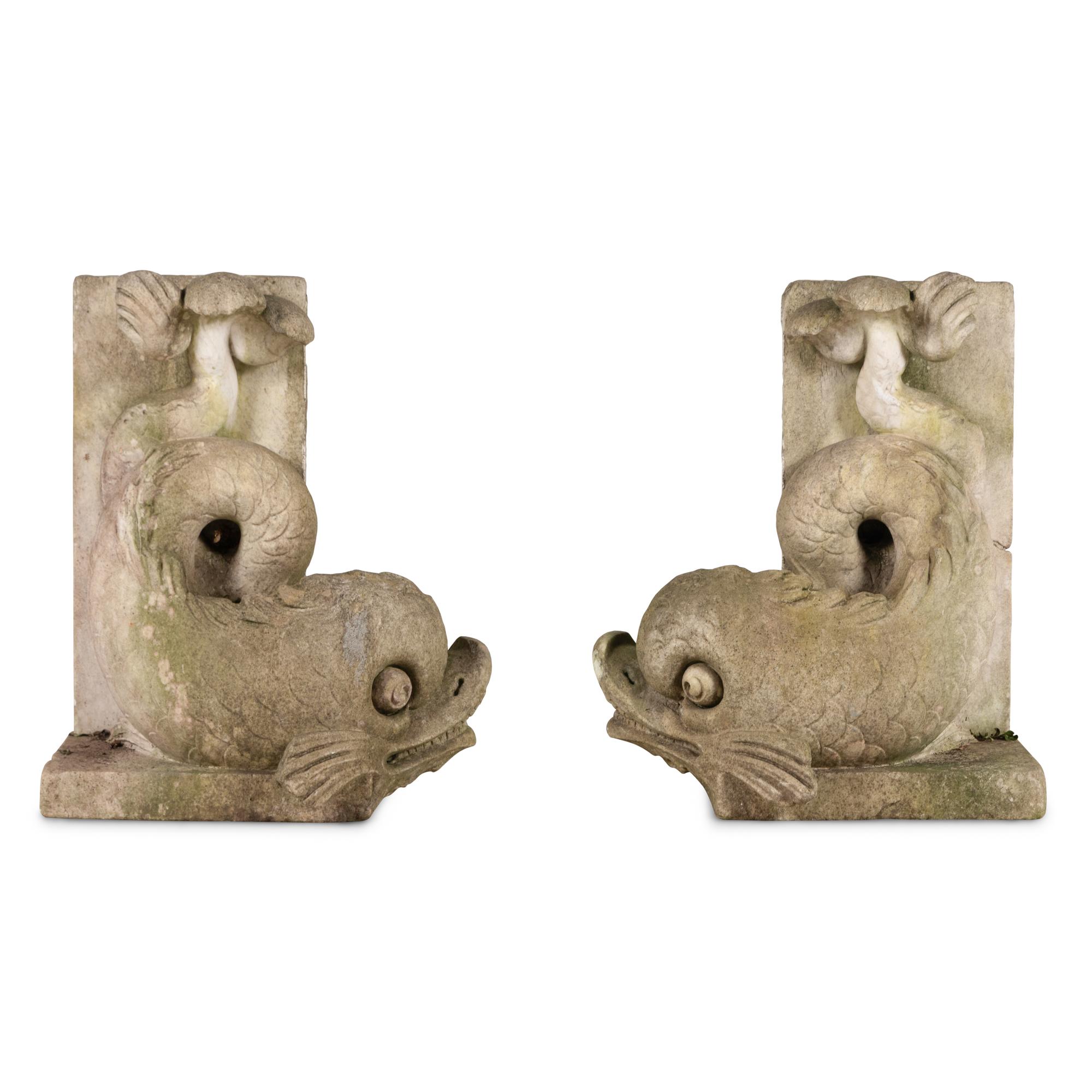 A Pair of Carved Stone Dolphins from Villa Turicum, Lake Forest, Illinois