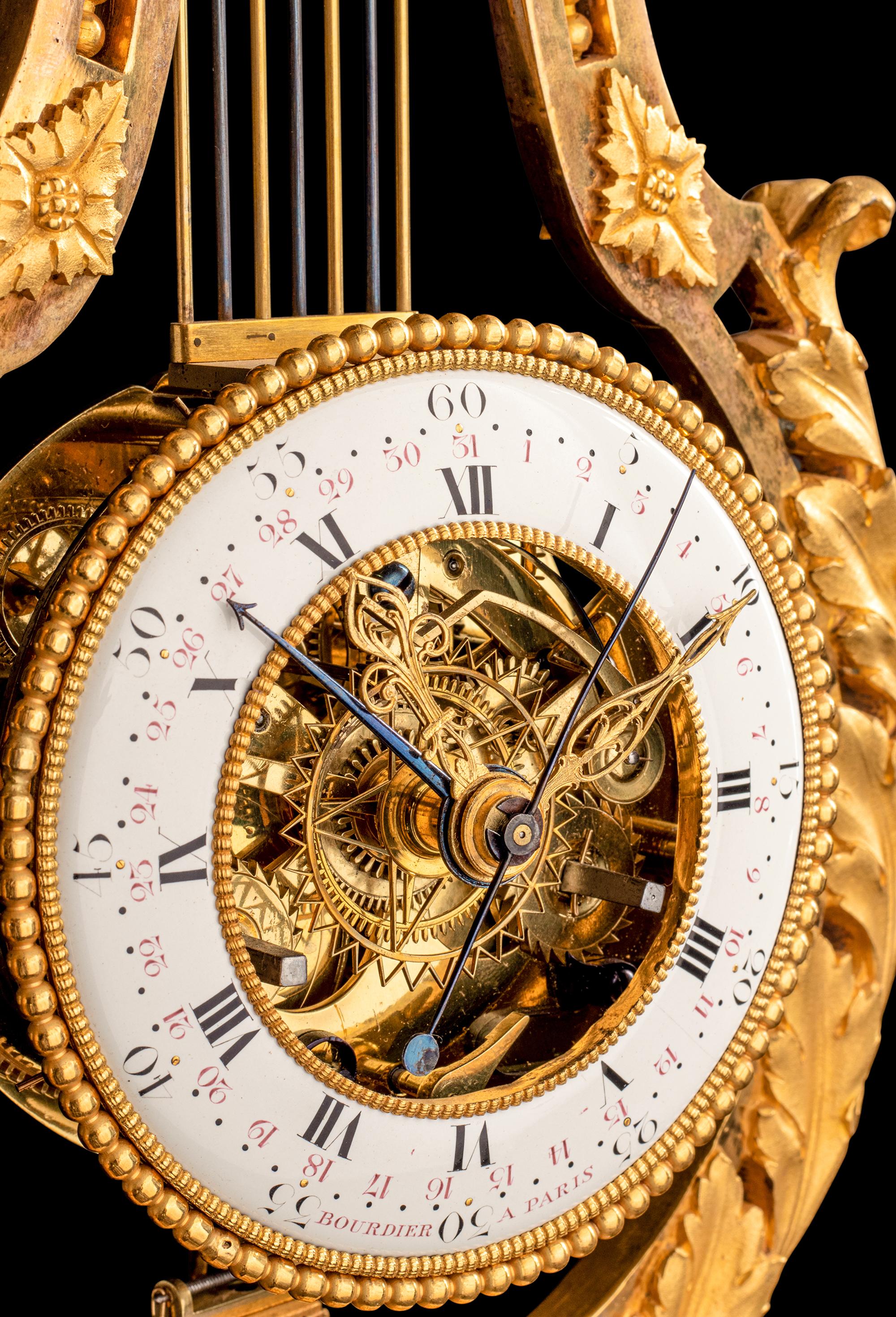A French Gilt Bronze and Marble Lyre-Form Clock, Bourdier