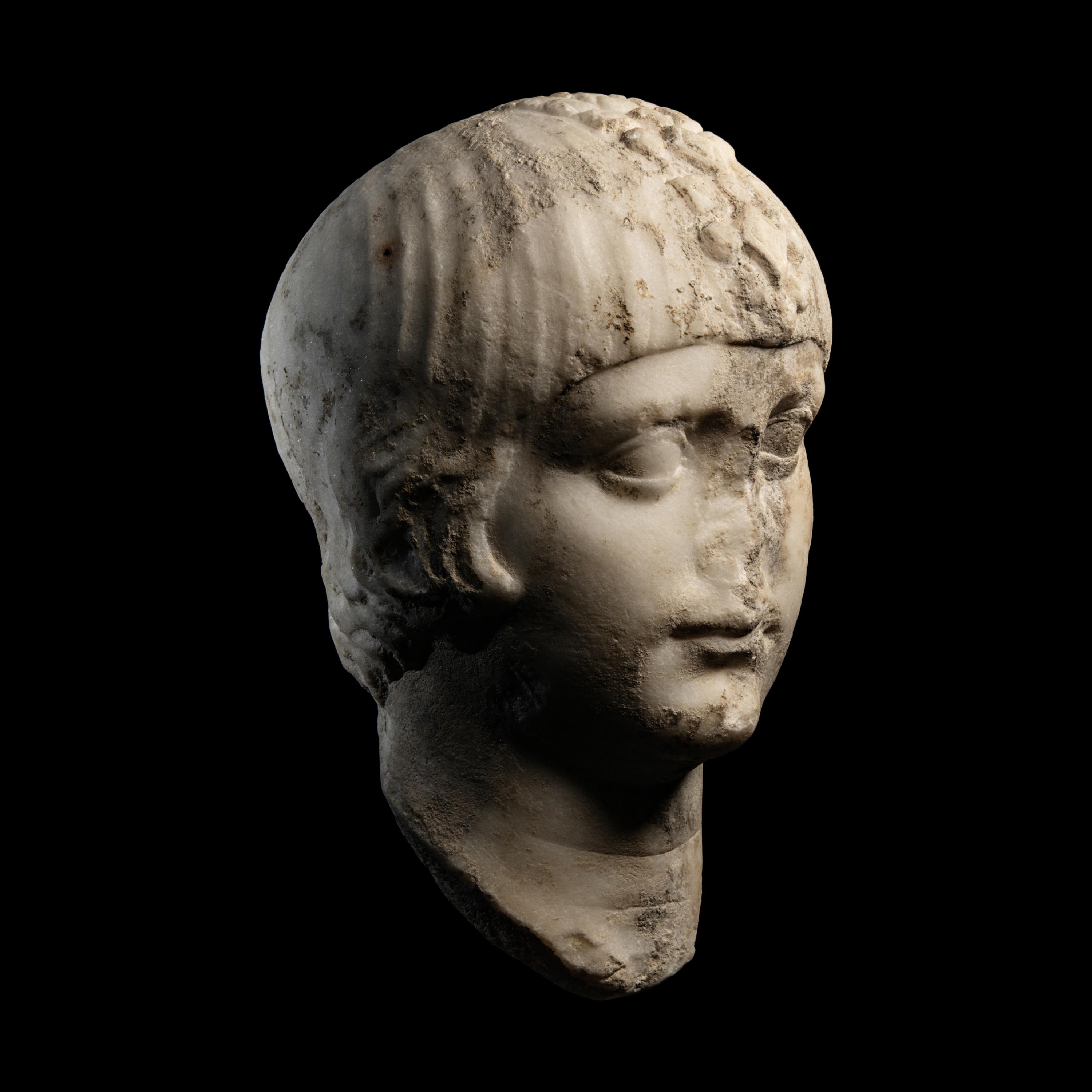 A Roman Marble Portrait Head of a Boy