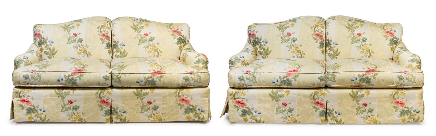 A Pair of Custom Upholstered Two-Seat Sofas Height 35 x width 65 x depth 29 inches.