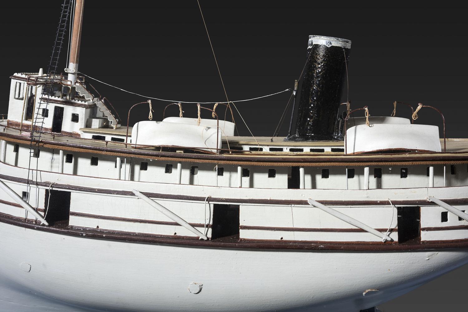 A Painted Wood Cased Steamboat Model