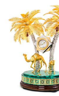A Gilt Metal and Malachite Veneered Clock Height 18 1/2 inches. — MODERN