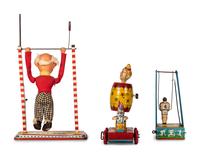 Four Tin Circus and Clown Toys