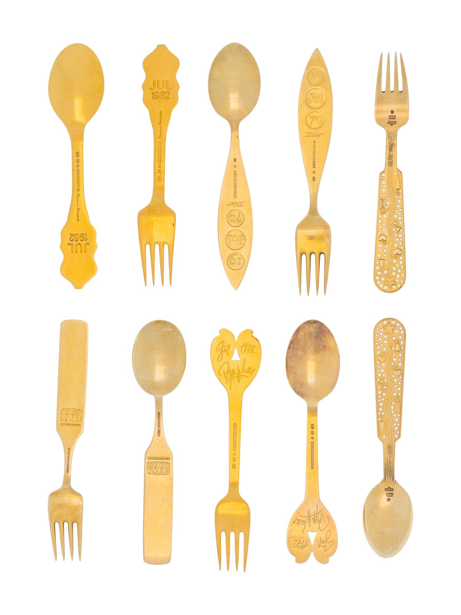 A Collection of Danish Silver-Gilt Christmas Fork and Spoon Sets