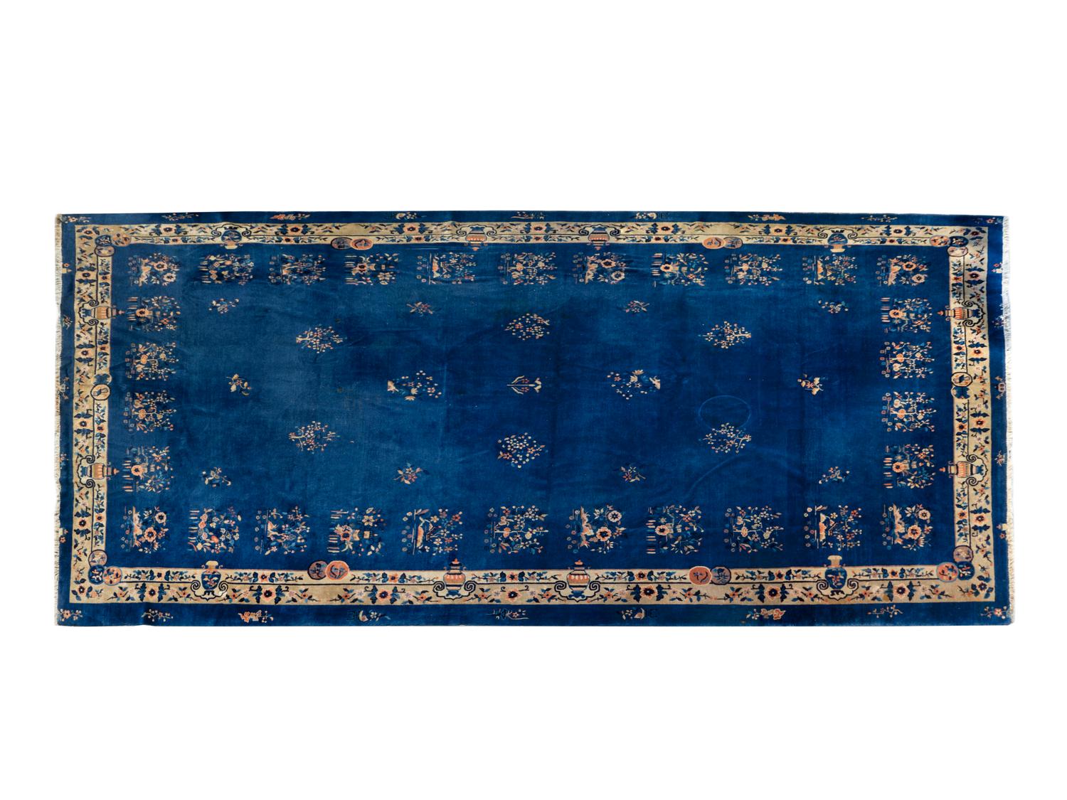 A Chinese Wool Rug — EARLY 20TH CENTURY