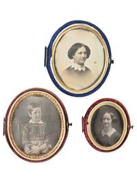 [EARLY PHOTOGRAPHY]. 24 daguerreotypes housed in oval velvet cases.