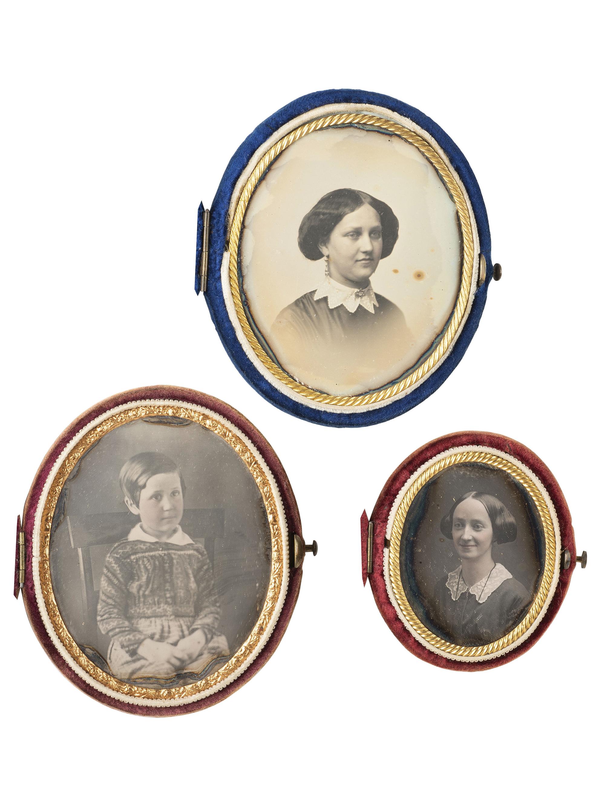 [EARLY PHOTOGRAPHY]. 24 daguerreotypes housed in oval velvet cases.
