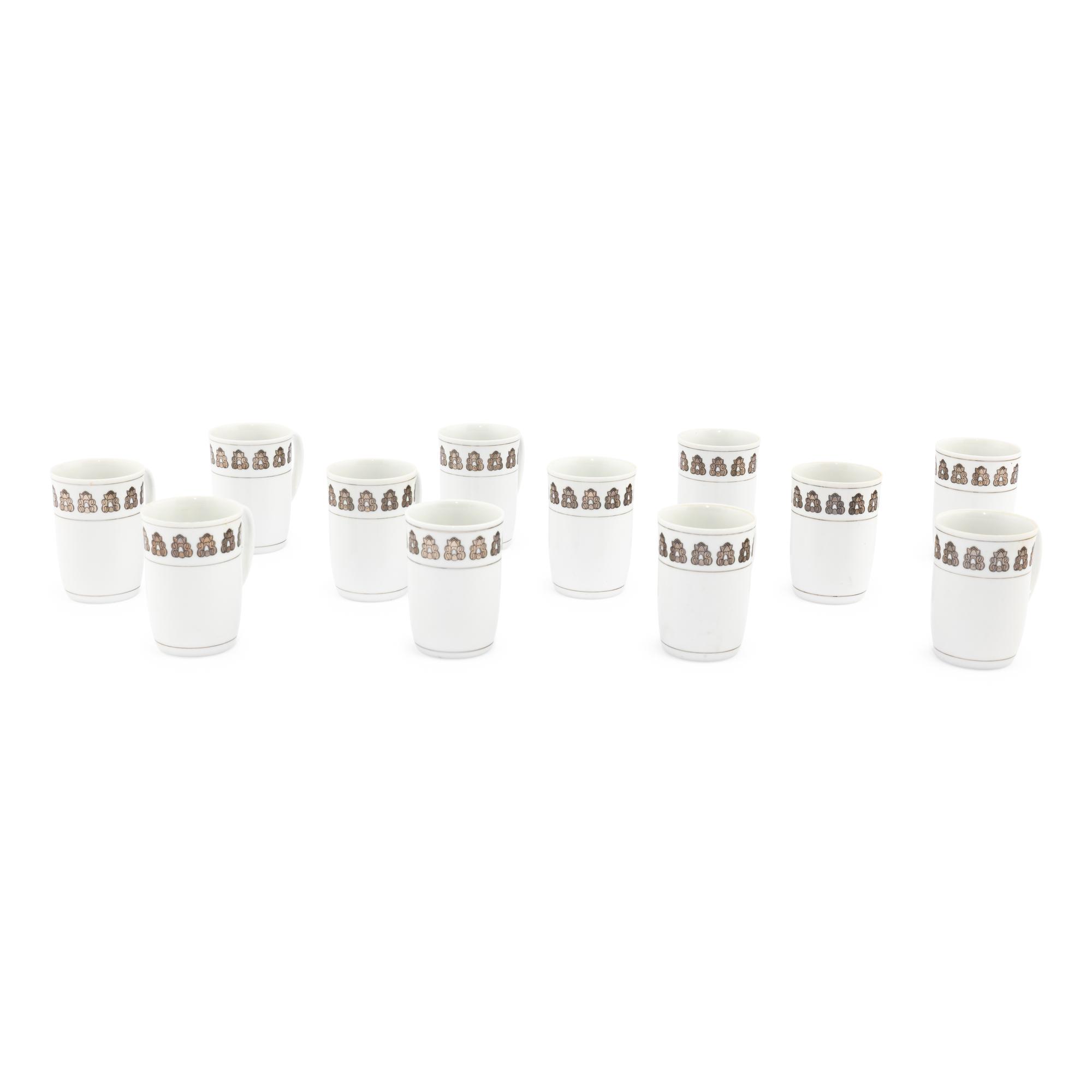 A Set of Twelve Georg Jensen Acorn Porcelain Coffee Mugs