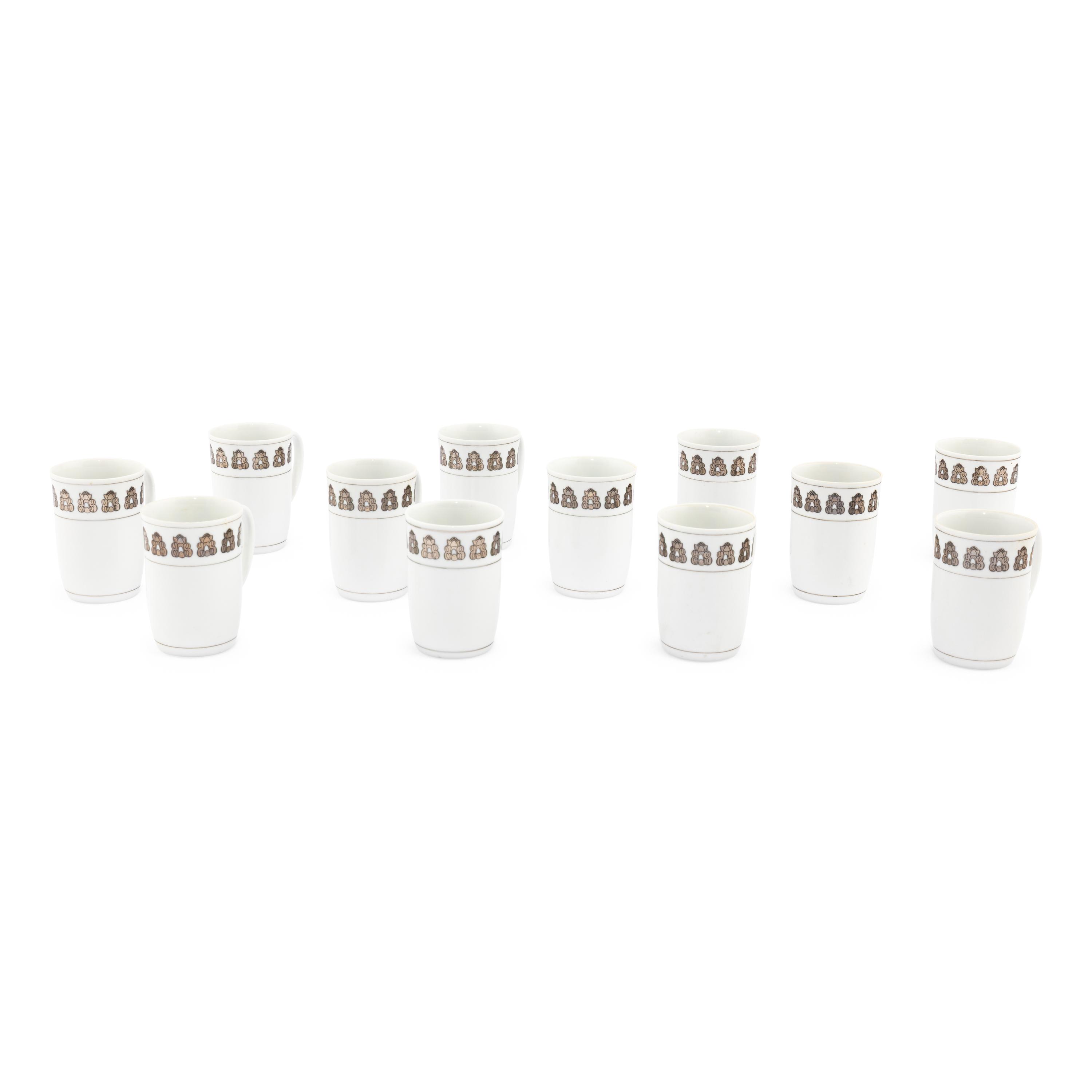 A Set of Twelve Georg Jensen Acorn Porcelain Coffee Mugs