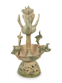A Han Pottery Phoenix Oil Lamp