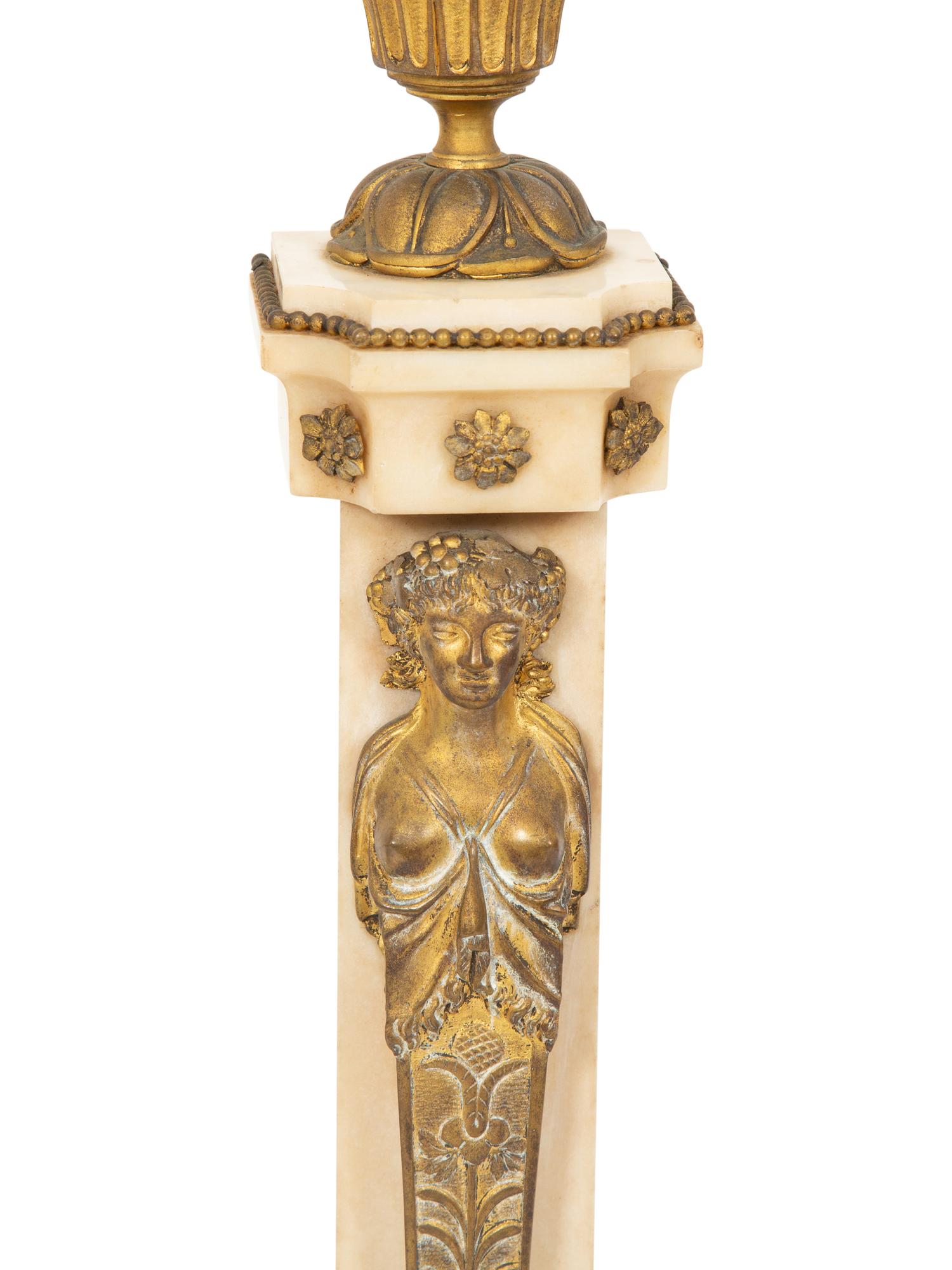 A Pair of Louis Philippe Gilt Metal and Marble Four-Light Candelabra