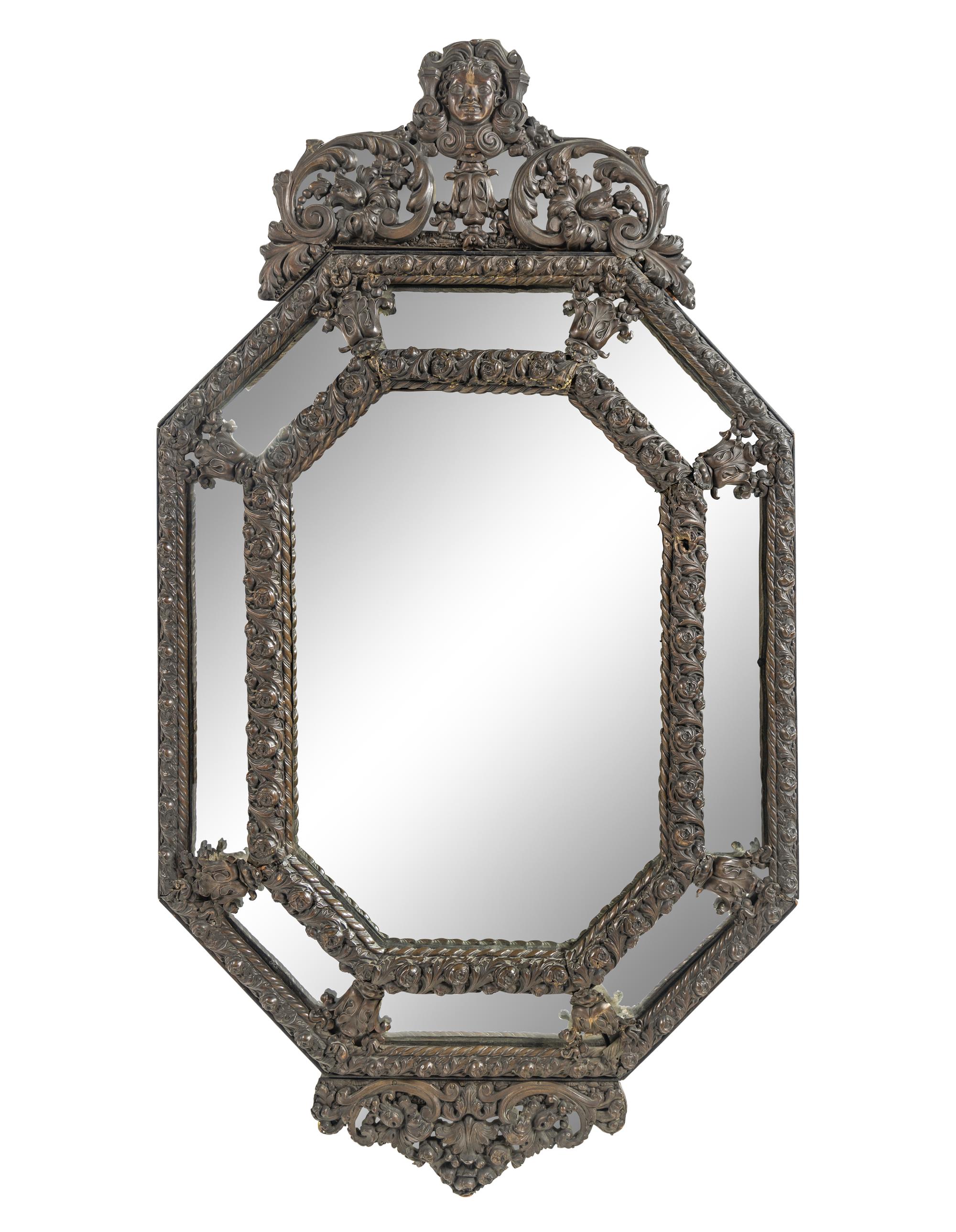 A Dutch Baroque Style Pressed Brass Mirror