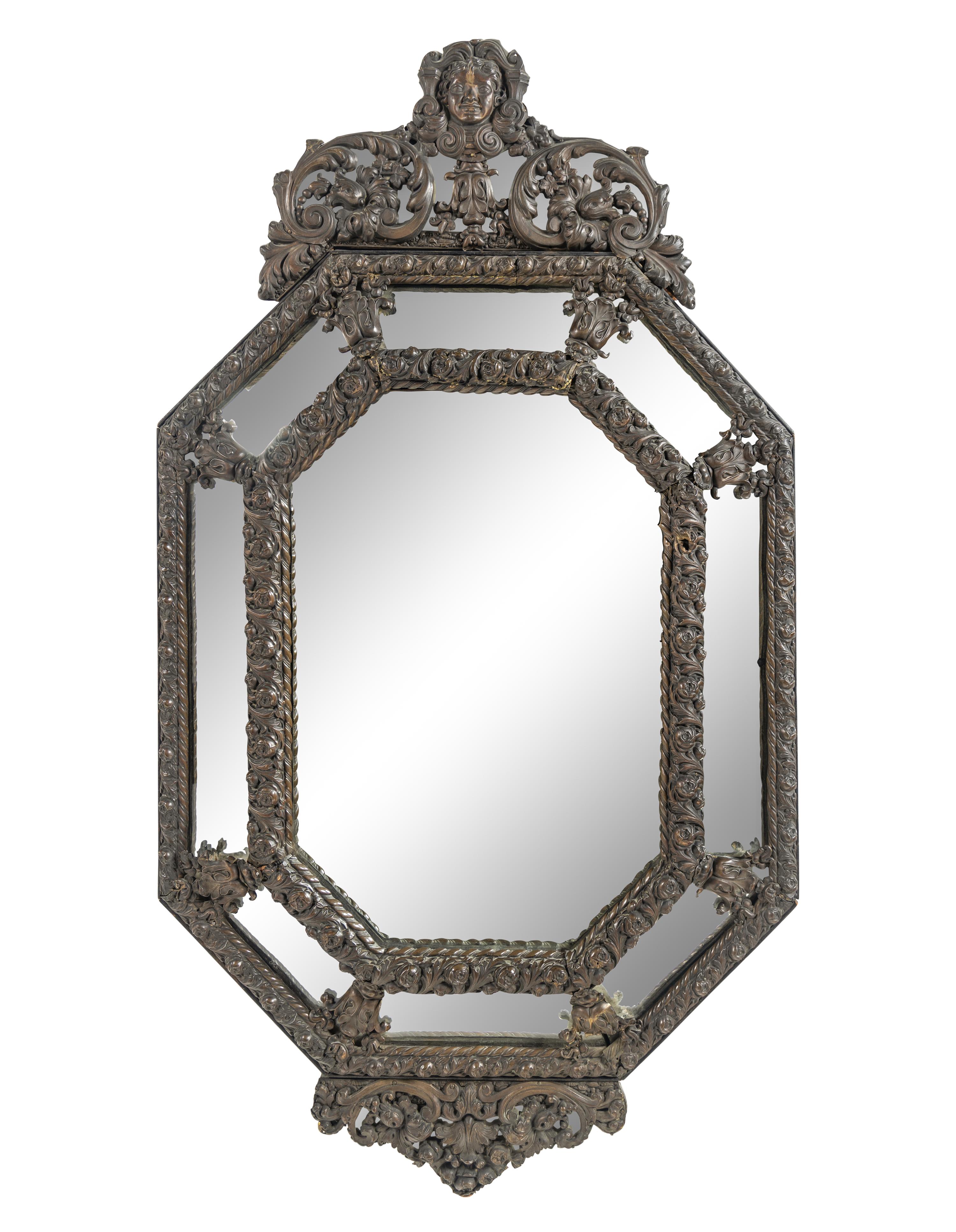 A Dutch Baroque Style Pressed Brass Mirror