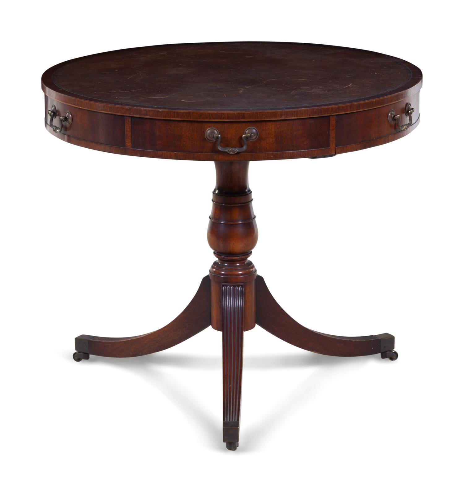 A George III Style Tooled Leather Inset Mahogany Drum Table