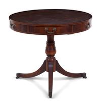 A George III Style Tooled Leather Inset Mahogany Drum Table