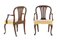 A Pair of George III Tassel-Carved Mahogany Scroll-Foot Armchairs
