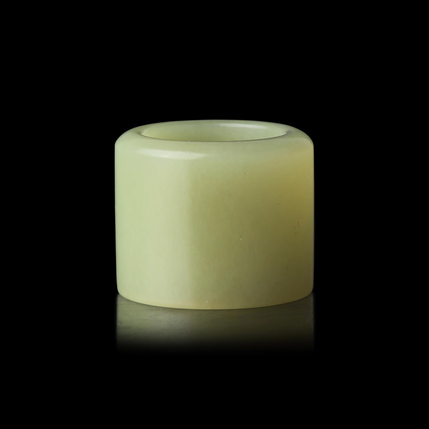 A Chinese Yellow Jade Archer's Ring, 18th/19th Century 清中期 黃玉素面扳指