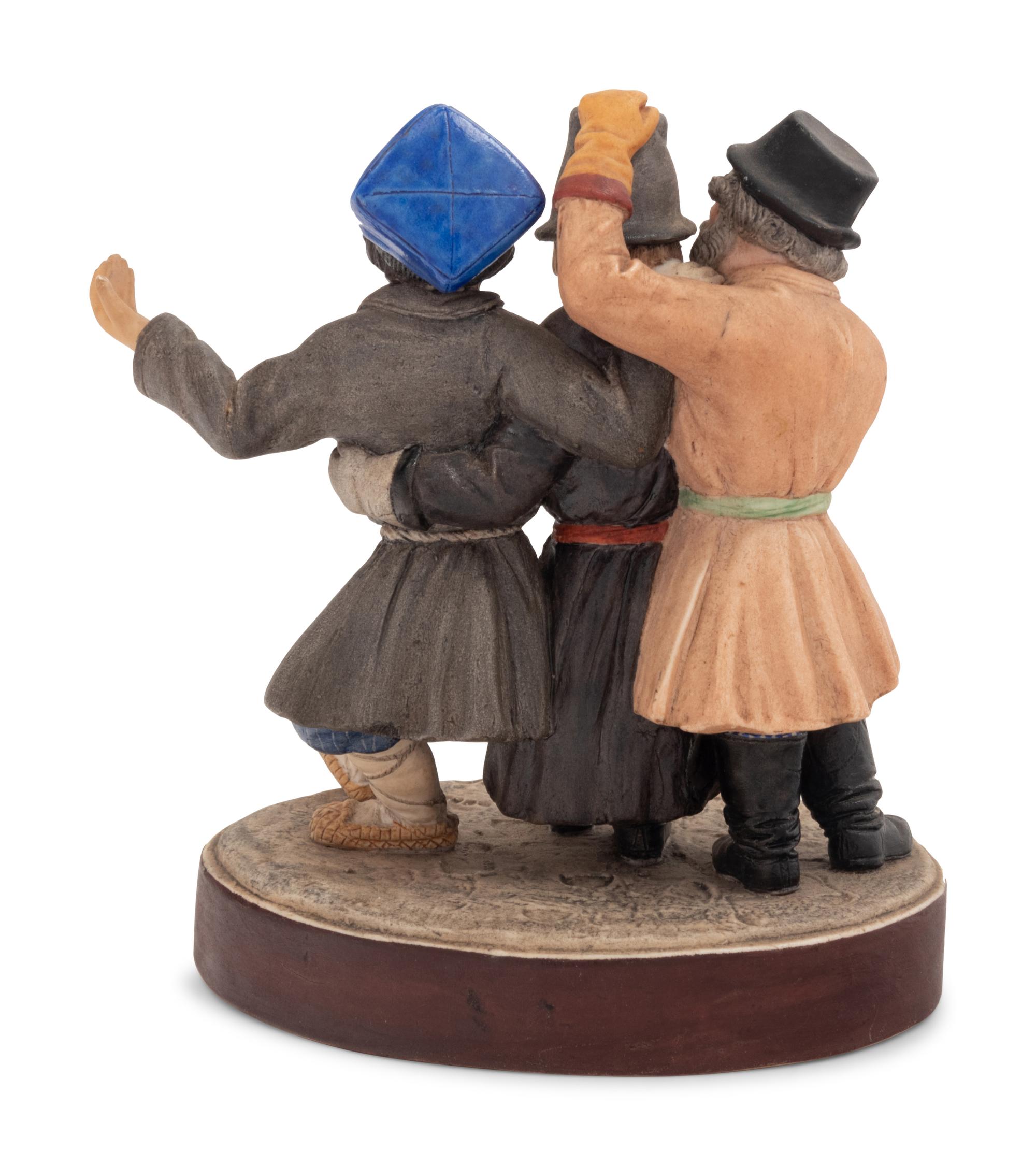 A Russian Bisque Porcelain Figural Group of Peasants