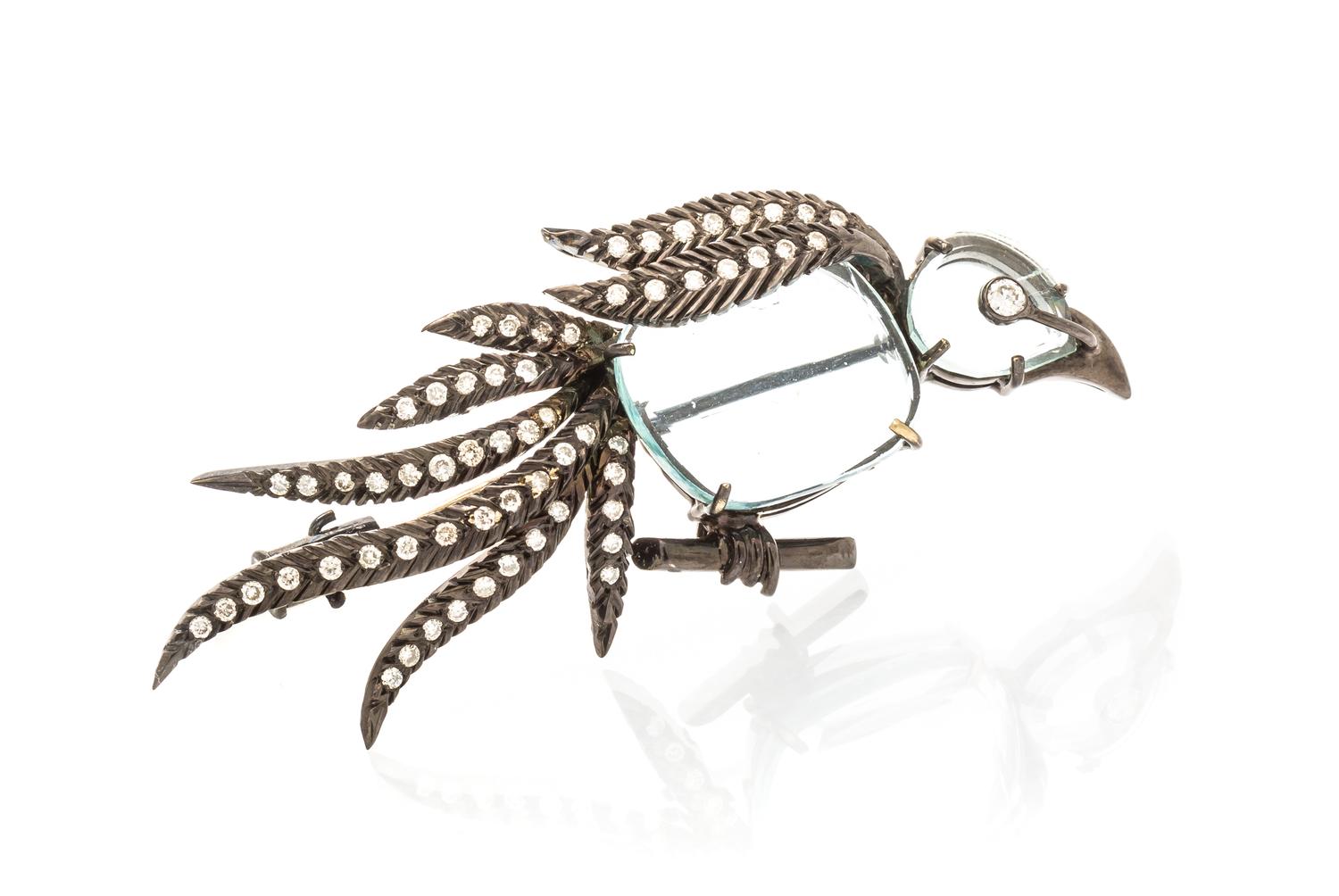 A Collection of 18 Karat Gold, Diamond and Aquamarine Brooches, 14.40 dwts.