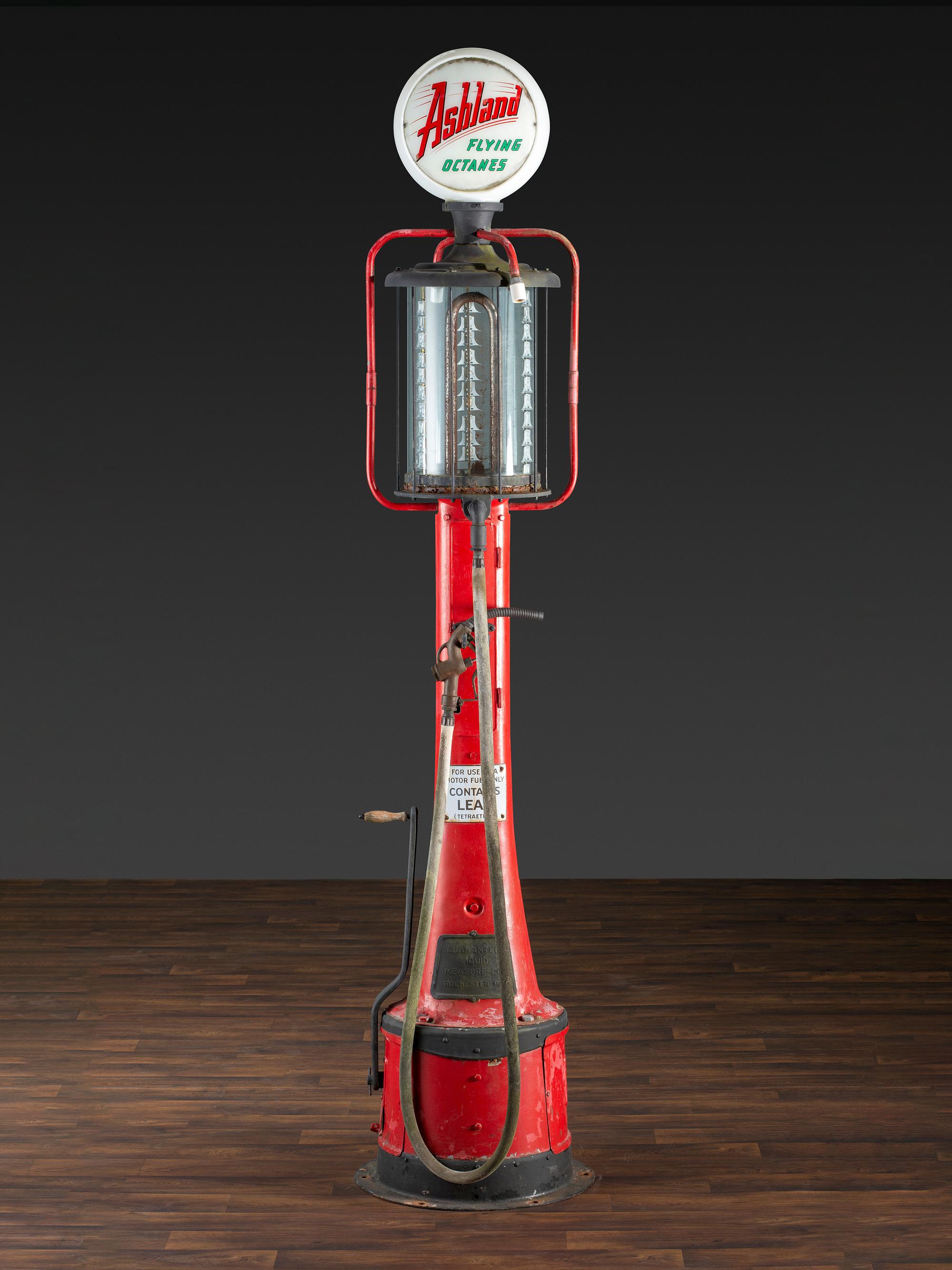 An American Painted Metal Gravity Gas Pump, Guarantee Liquid Measure