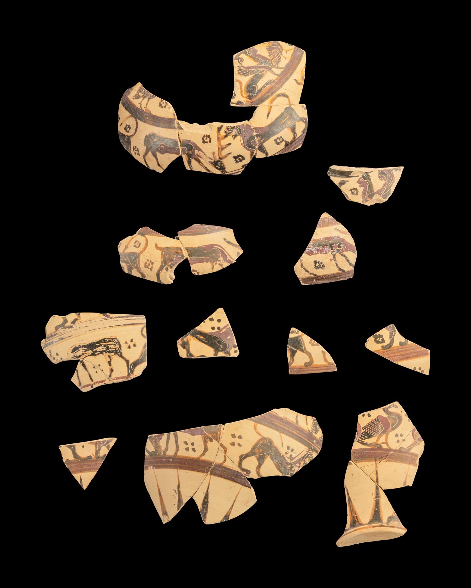 12 Early Corinthian Black-Figured Trefoil Oinochoe Fragments with Animal Friezes