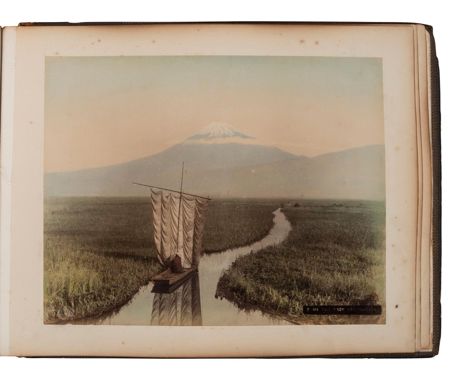 [EARLY PHOTOGRAPHY]. Album containing 50 hand-colored photographs of Japan.