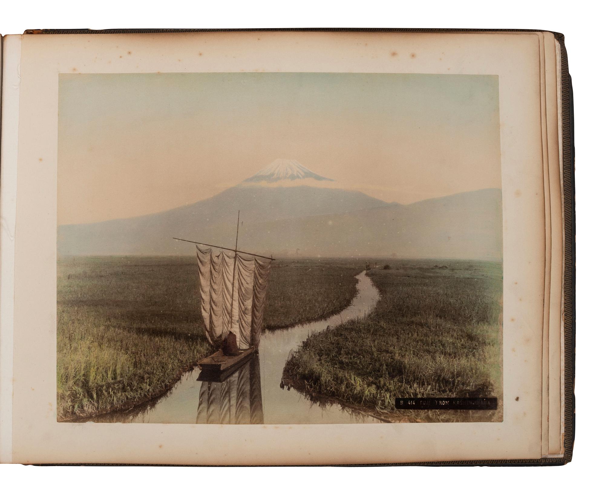[EARLY PHOTOGRAPHY]. Album containing 50 hand-colored photographs of Japan.