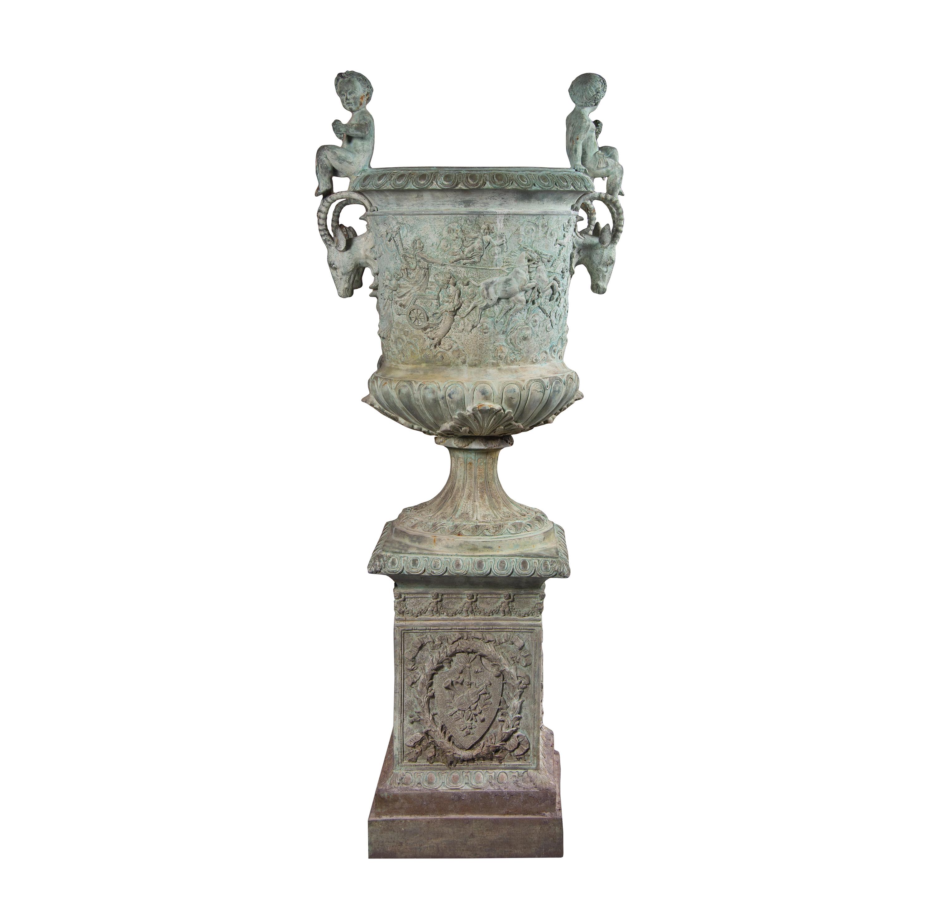 A Pair of Neoclassic Style Patinated Bronze Garden Urns and a Fountain