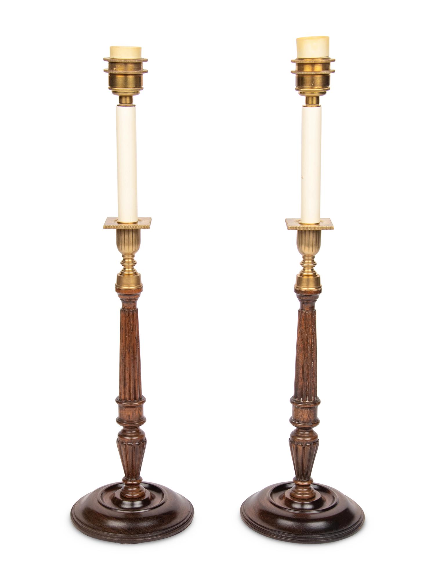 A Pair of Brass Mounted Mahogany Candlesticks