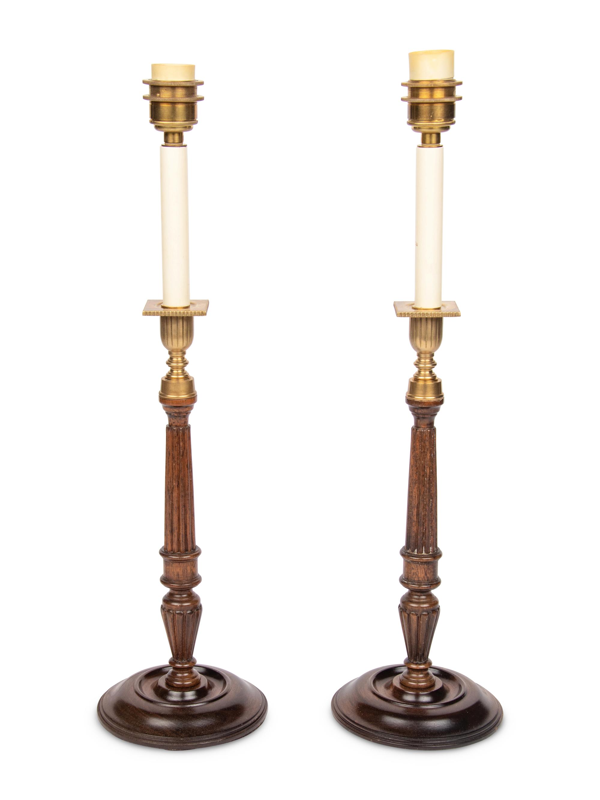 A Pair of Brass Mounted Mahogany Candlesticks