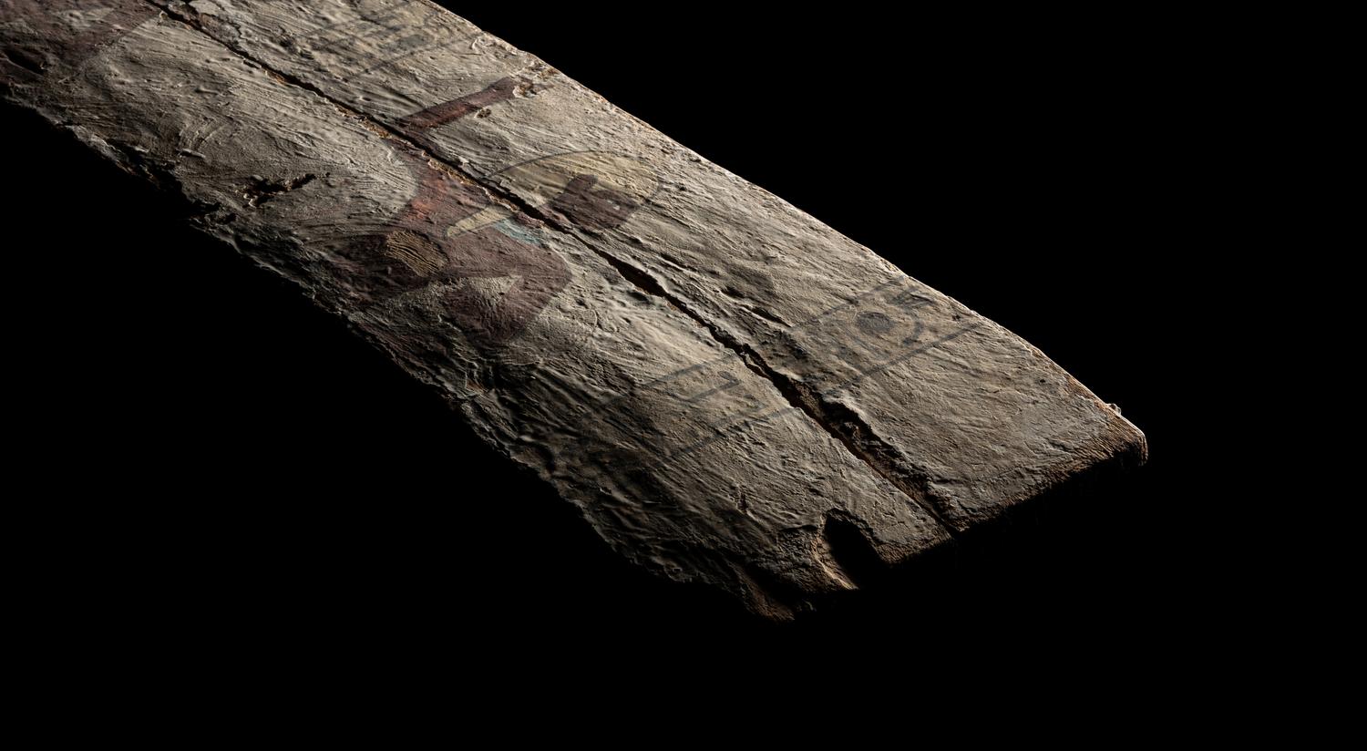 An Egyptian Painted Wood Sarcophagus Panel
