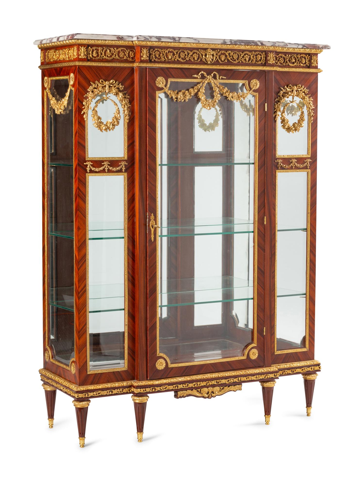 A Louis XVI Style Gilt Bronze Mounted Marble-Top Vitrine Cabinet