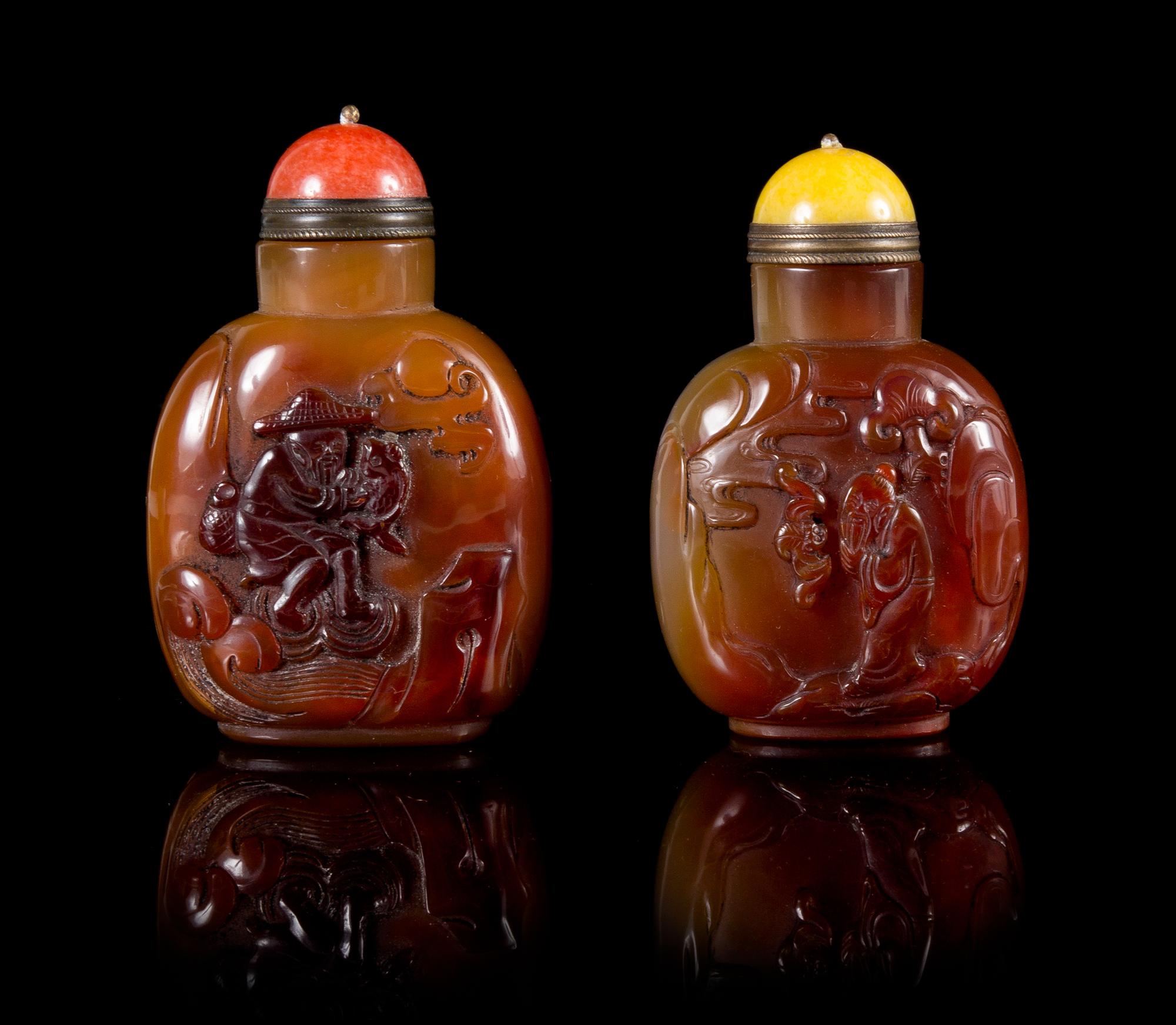 Two Carved Agate Snuff Bottles Height of larger 3 1/4 inches.
